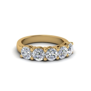 gold ring with 5 diamonds