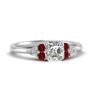 Pear Accented Engagement Ring