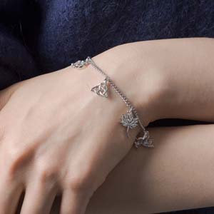 Fascinating Diamonds Love Symbol Gold Charm Bracelet for Women White Gold