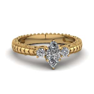 Gold Marquise Shaped 3 Stone Rings