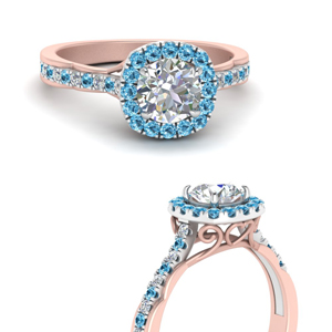 Cathedral Halo Two Tone Blue Topaz Ring